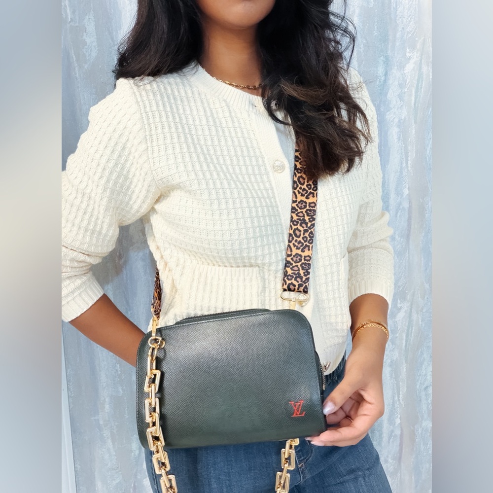Sold! LV Taiga leather clutch crossbody